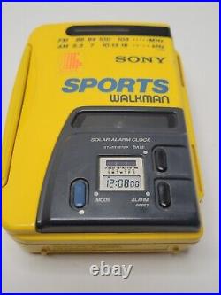 Sony Walkman Sports WM-AF58 Cassette Solar Power Alarm Clock AM/FM NEW BELT